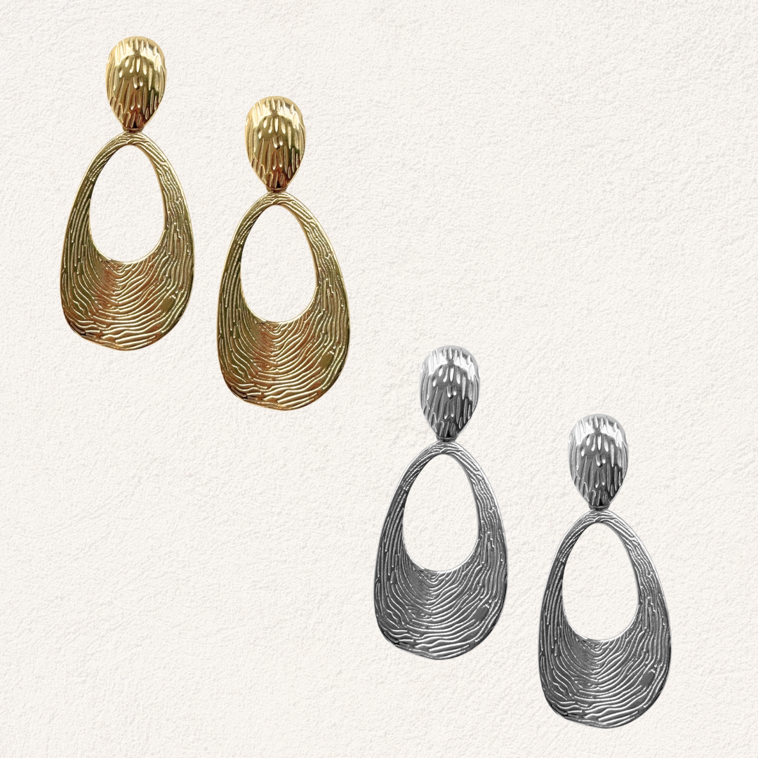 statement oorbellen golvend patroon