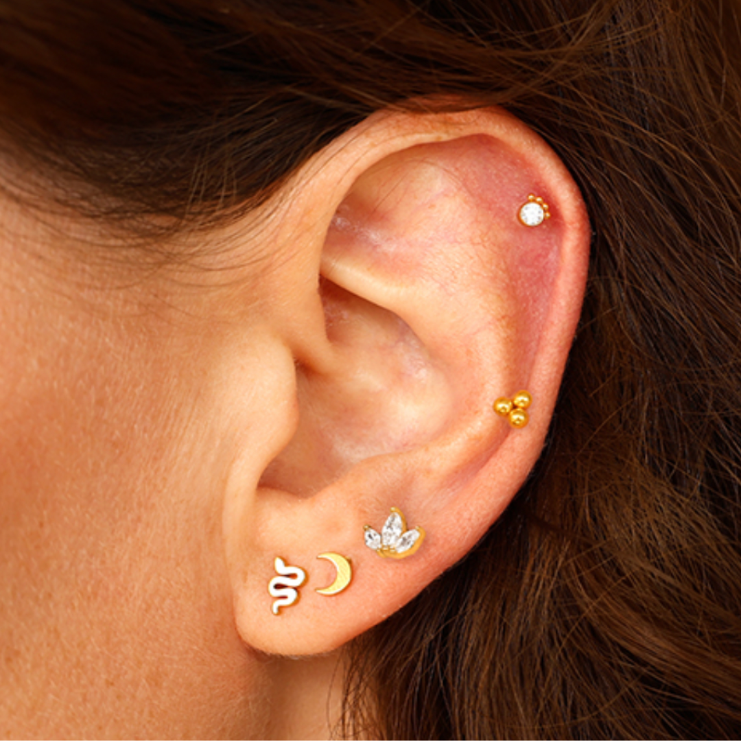 piercing with three crystal leaves