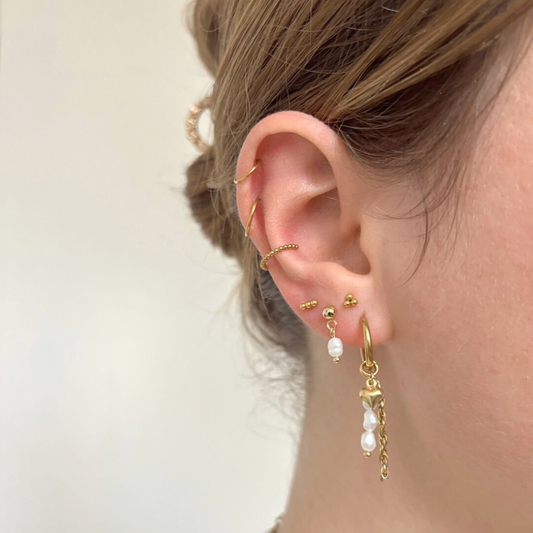 piercing met staafje balletjes