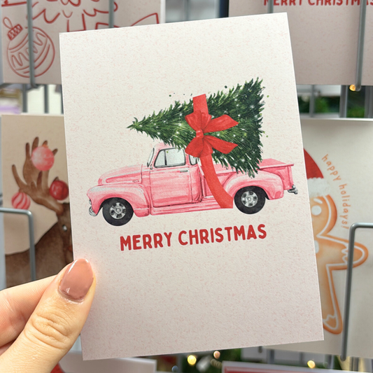 kerstkaart roze pick up met kerstboom