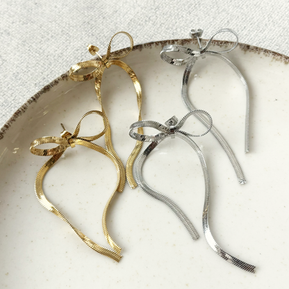 large bow statement earrings