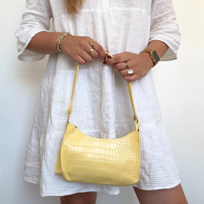 white shiny shoulder bag with print