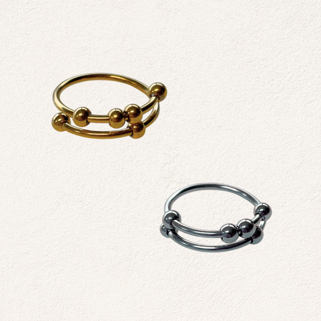 anxiety ring met beweegbare balletjes, verstelbaar