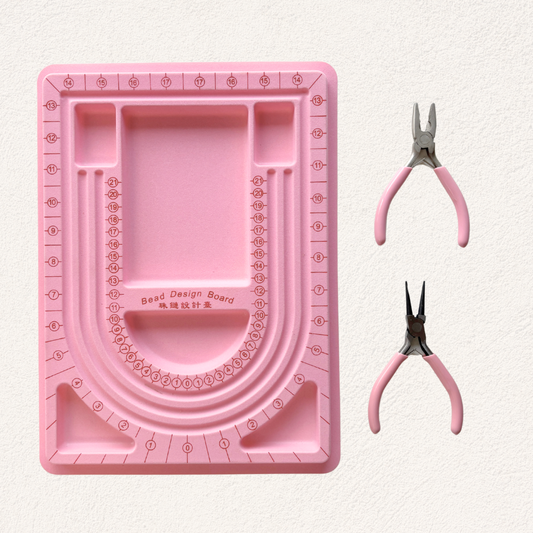 roze sieraden maak set met tangen en legbord