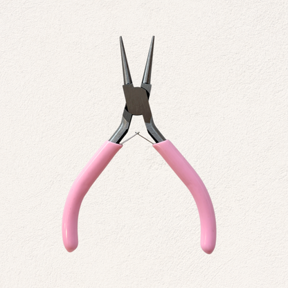 rondbektang met roze handvat