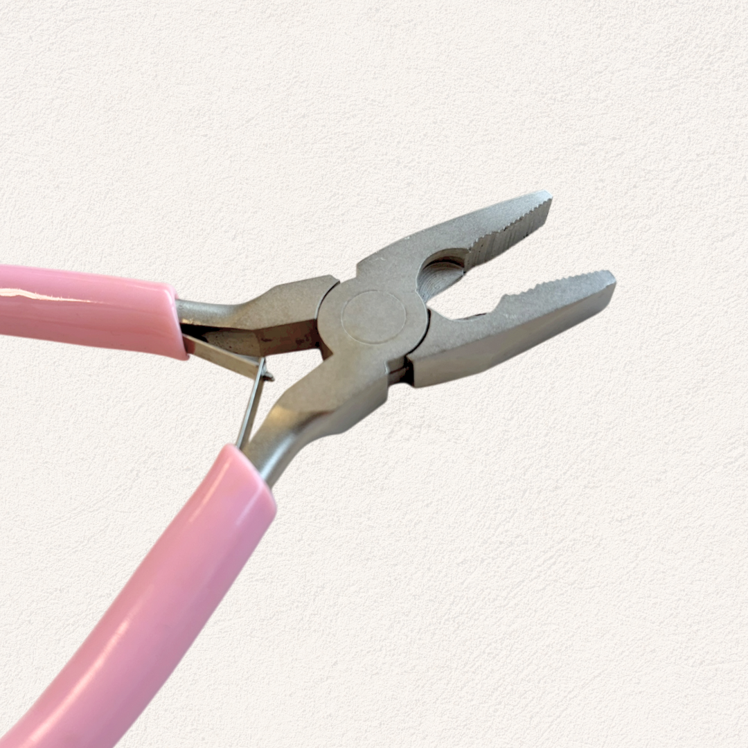 combinatietang met roze handvat