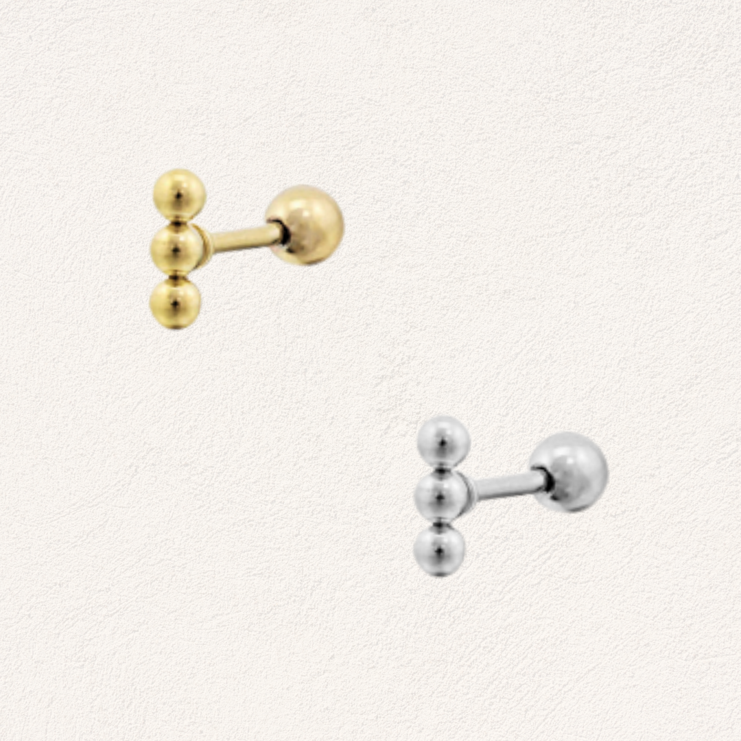 piercing met staafje balletjes