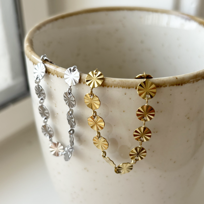 bracelet with patterned coins