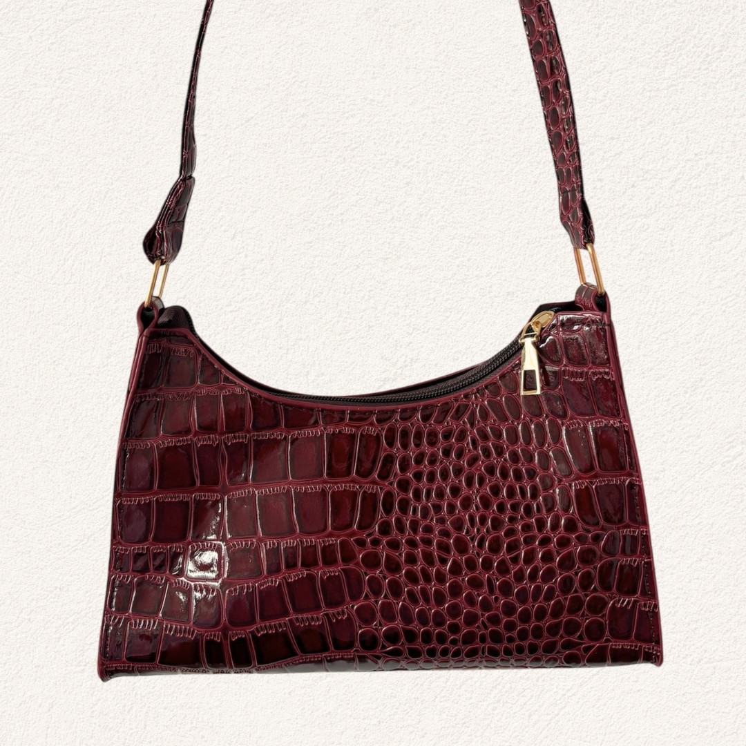 bordeaux rode glimmende schoudertas met print