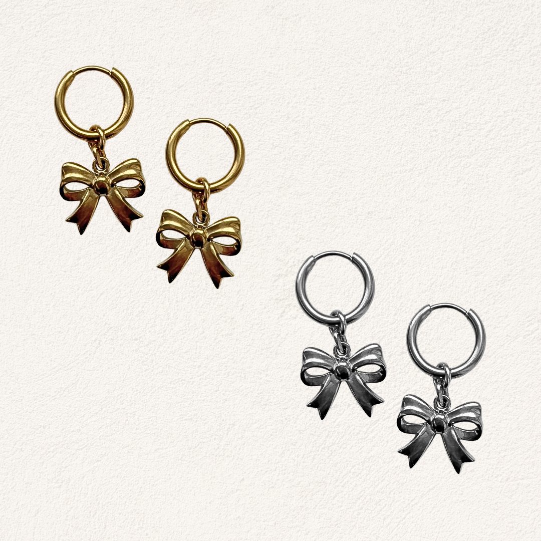 Kleine strikjes oorbellen product foto stainless steel goud en zilverkleurig