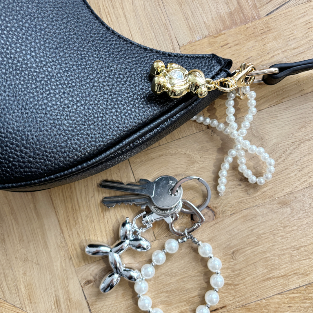 parel en hartjes tassen en sluitelhanger