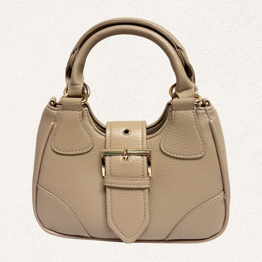 beige handbag with a gold buckle