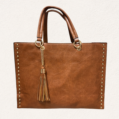 brown shopper with gold details and tassel