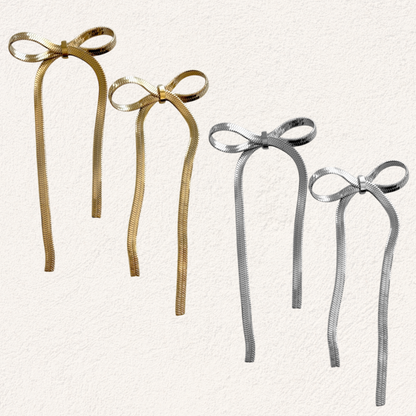 large bow statement earrings