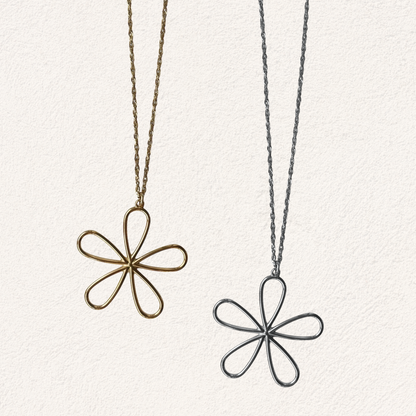 lange ketting met grote open bloem