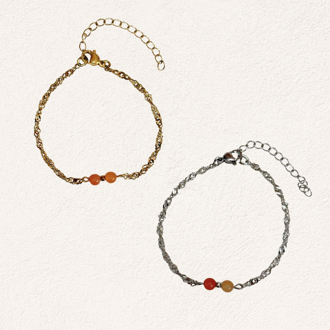 oranje natuursteen met gedraaide schakel armband