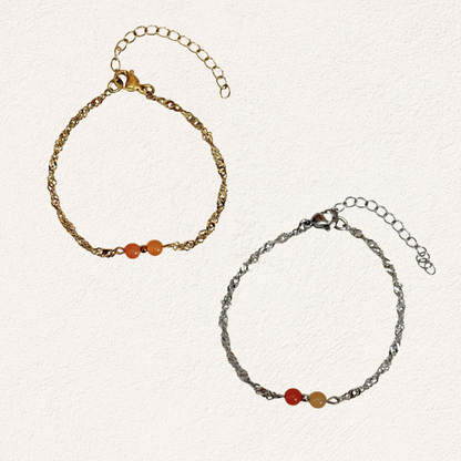 oranje natuursteen met gedraaide schakel armband