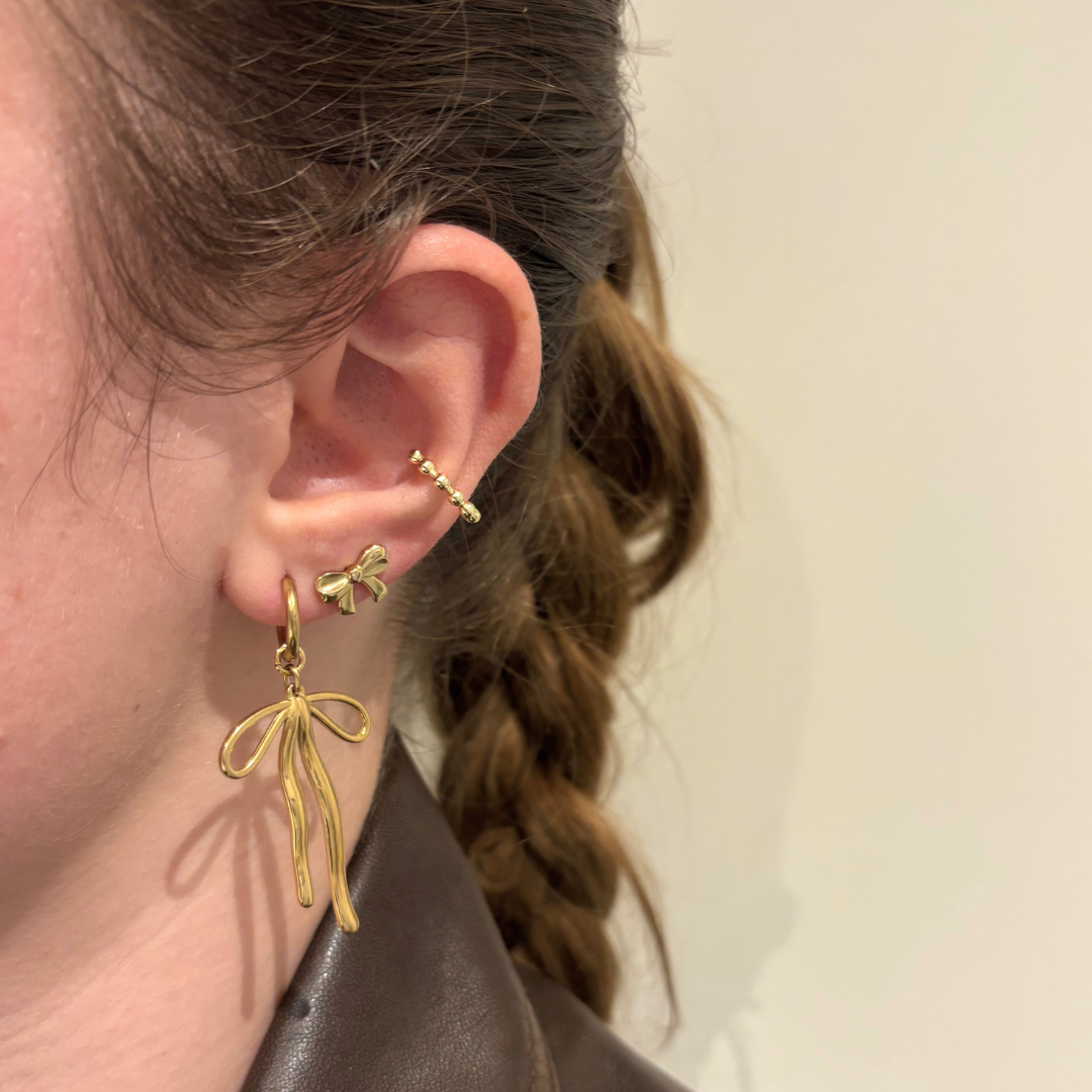 strik stud oorbellen aanfoto stainless steel oorbellen