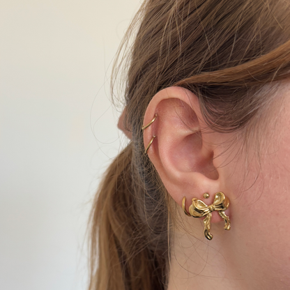 bow statement earrings